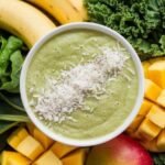 Looking for a healthy way to boost your metabolism? This Tropical Green Metabolism Booster is a refreshing drink loaded with tropical flavors and greens. Perfect for energy and weight loss! #HealthySmoothieRecipe #MetabolismBoost #TropicalGreenDrink